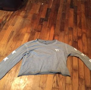 A pink crop sweatshirt